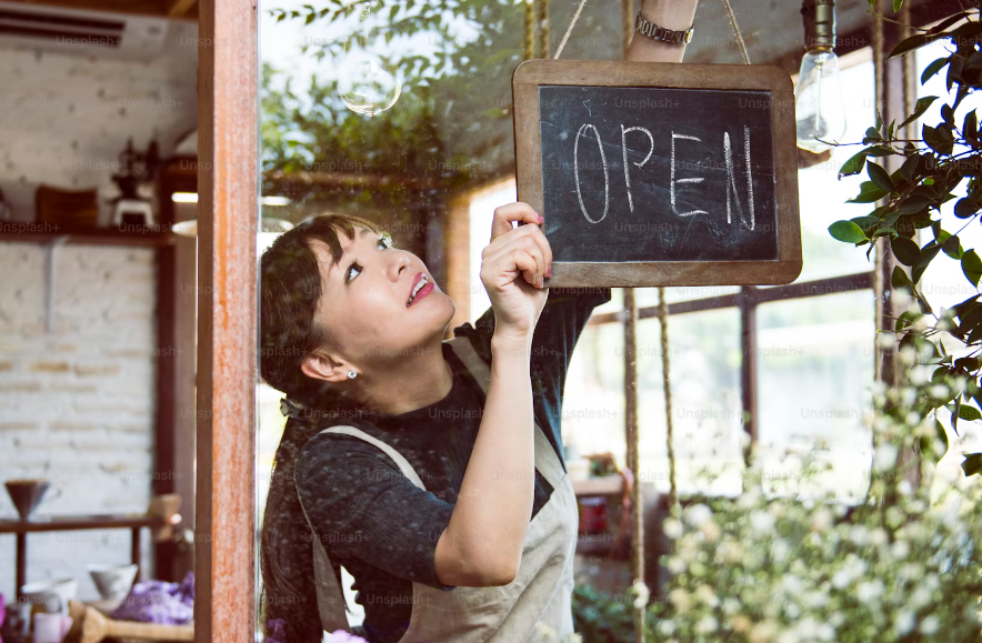 a woman opening her business