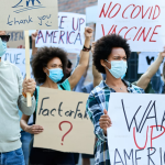 People are protesting showing card boards in america
